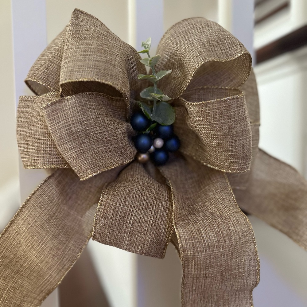 Burlap with blue and eucalyptus leave bows for decoration